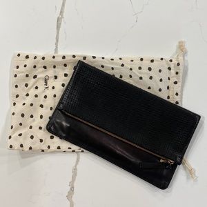 Clare V foldover perforated clutch